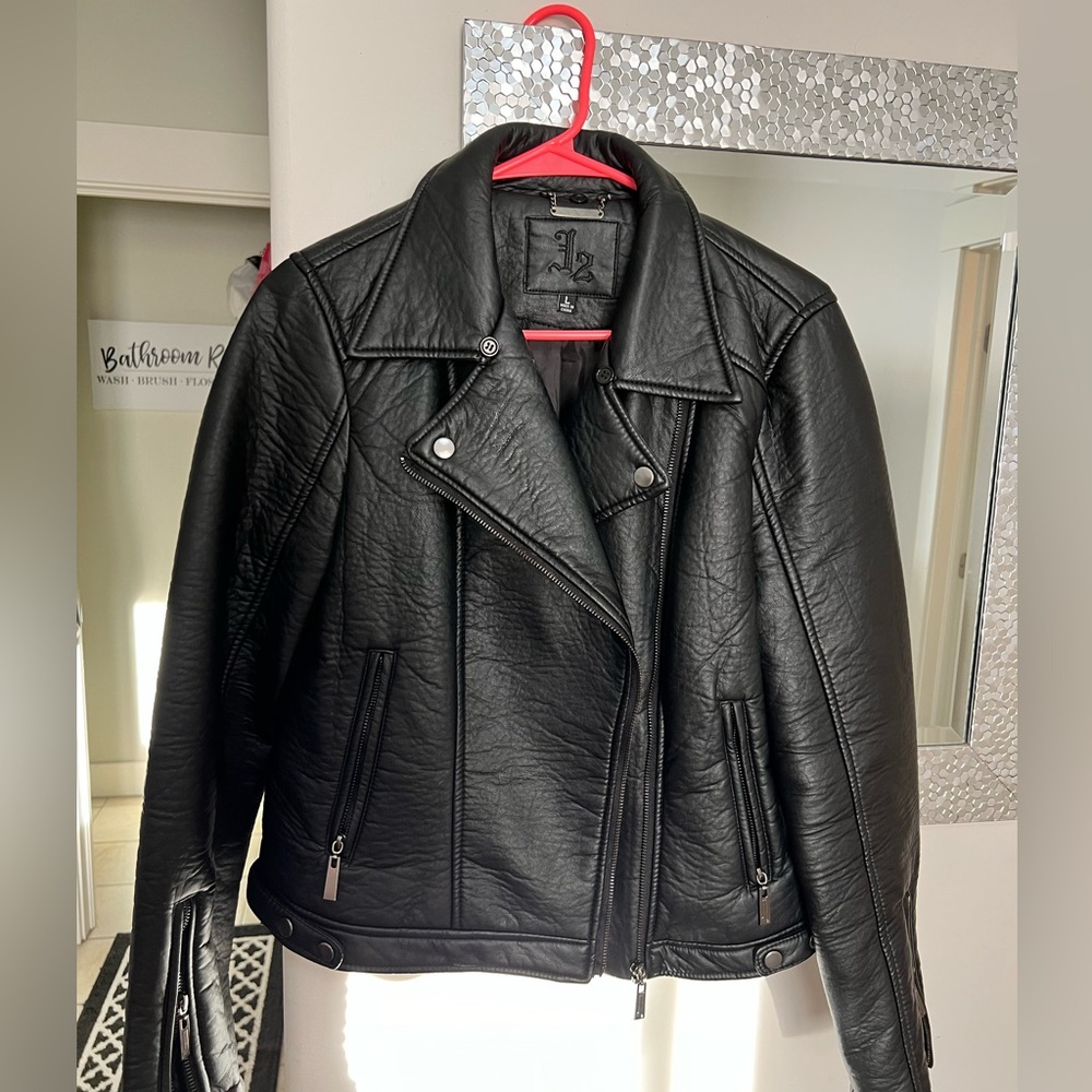 Women’s size L faux leather jacket.